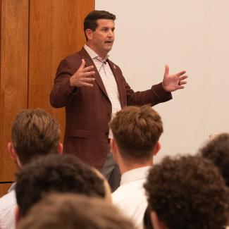 Brian Murphy speaks to students in the Murphy Forum.